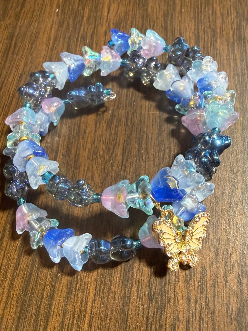 Handmade Blue & Lavender Glass Flower Bead Bracelet with Gold Butterfly Charm